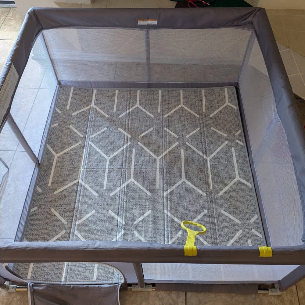 Gray Playpen with Geometric Mat
